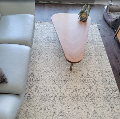 A picture of a customer&s carpet inside what seems to be their living room.